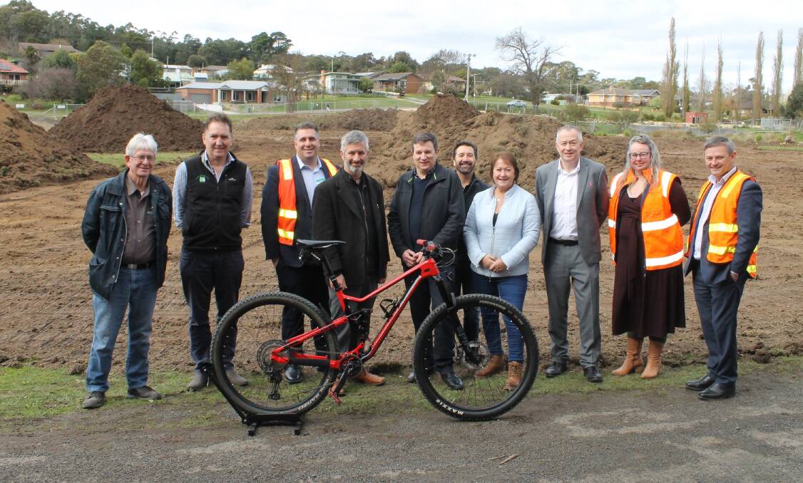 MORE MONEY: Representatives from Hepburn Shire Council. VOGA and the local Community Bank at the Hammon Park Trailhead site at Creswick. Picture: SUPPLIED