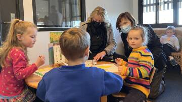 Early Childhood and Pre-Prep minister Ingrid Stitt and Macedon MP Mary-Anne Thomas with students at the new Kyneton kindergarten. Picture: SUPPLIED