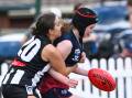 Castlemaine recruit Maeve Tupper lays a big tackle in the Magpies 117-point win on Sunday. Picture by Darren Howe