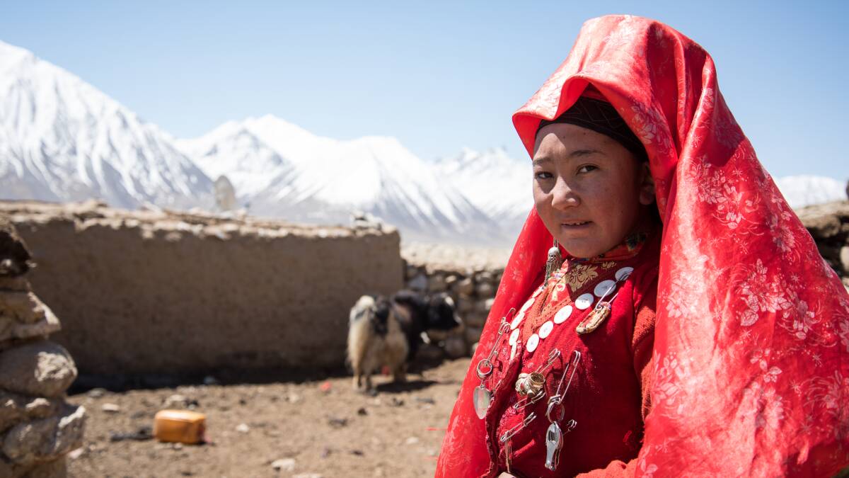 Young, unmarried girls wear bright red veils in the Wakhan corridor. Pic: Marta Pascual Juanola.