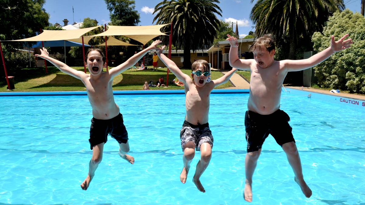 Daylesford pool officially opened.
Brothers Billy and Josh Crooks and their friend Freddy Hadingham took advantage of the hot day to spend at the pool.

Picture: JULIE HOUGH