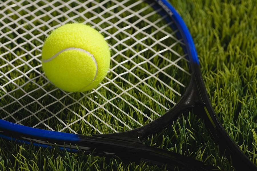 COMPETITION: Daylesford players compete on grass courts.