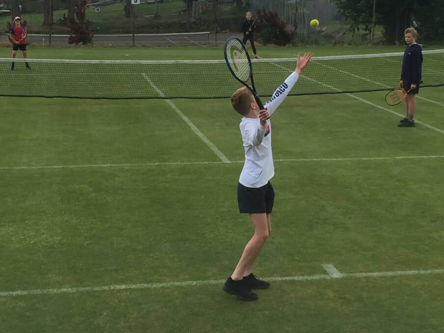 IN ACTION: Adam Leonard, winner of Division 2 in the junior competition, serves. Picture: SUPPLIED