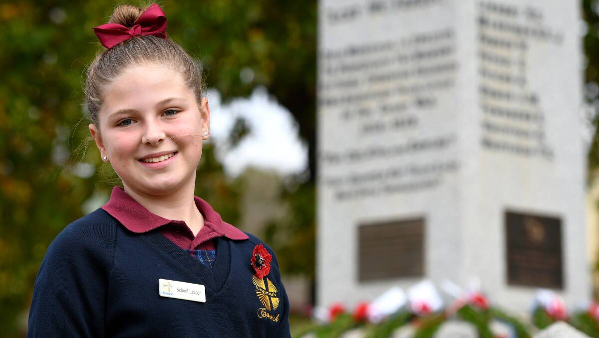 HONOUR: St Augustines school leader Sam Crilly proudly wears a poppy, handmade in Gallipoli, from her uncle who serves in the Australian Army. Pictures: Adam Trafford
