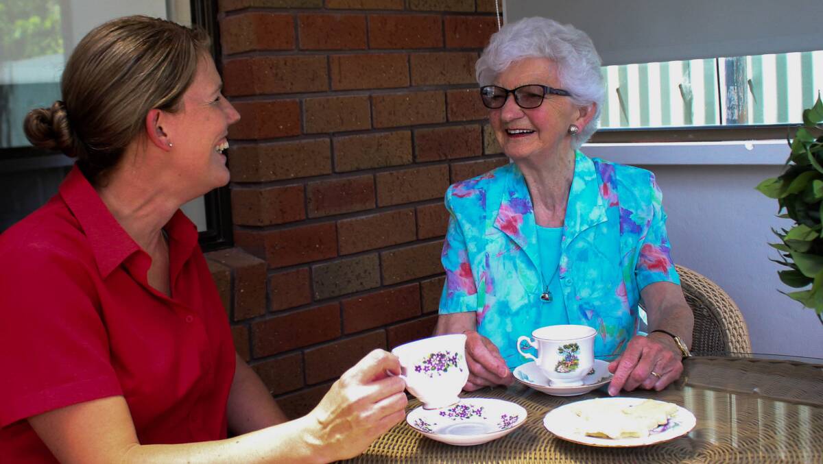 TEA FOR TWO: Personal carer Corrie Spicer regularly pays a visit to Daylesford's Mary Nield and says the best part of her job is seeing elderly people in the community stay in their homes and gain independence.
