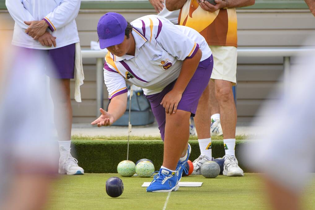 CONCENTRATION: Michael Booth of Creswick bowls during the match between the City Oval Bowls Club. Picture: Dylan Burns