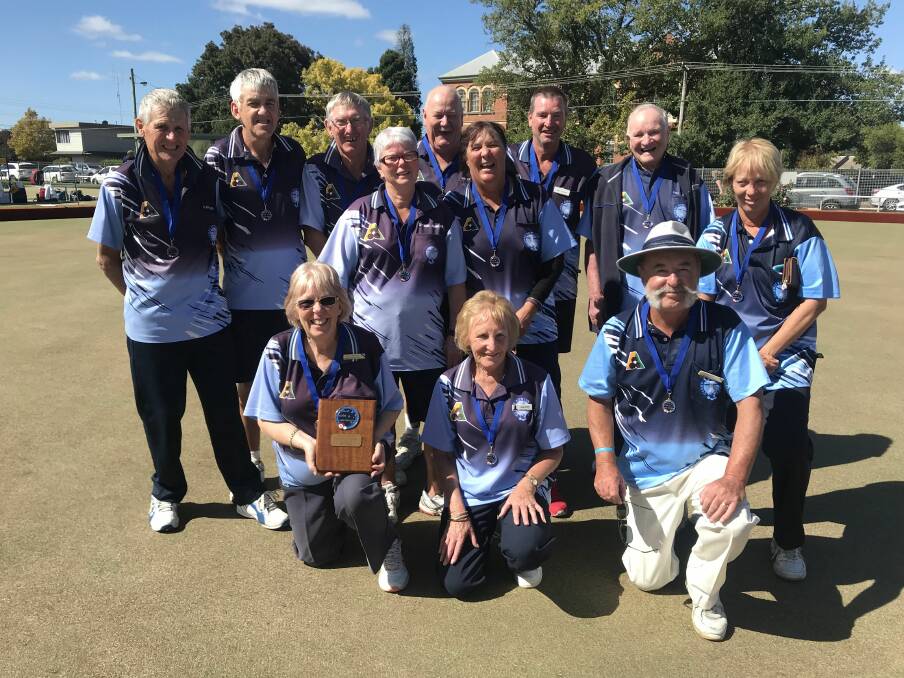WINNERS ARE GRINNERS: Members of the successful Clunes team celebrate winning division two BDBD grand final. Picture: Tim O'Connor
