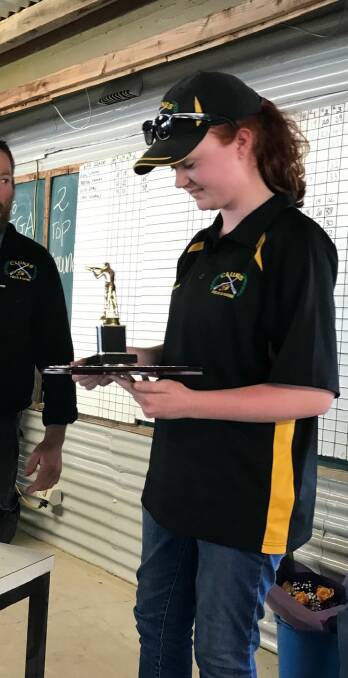 PRESENTATION: Clunes Field and Game Association junior member Michaela Shirley accepts the Hardy Family Junior Club Person trophy.