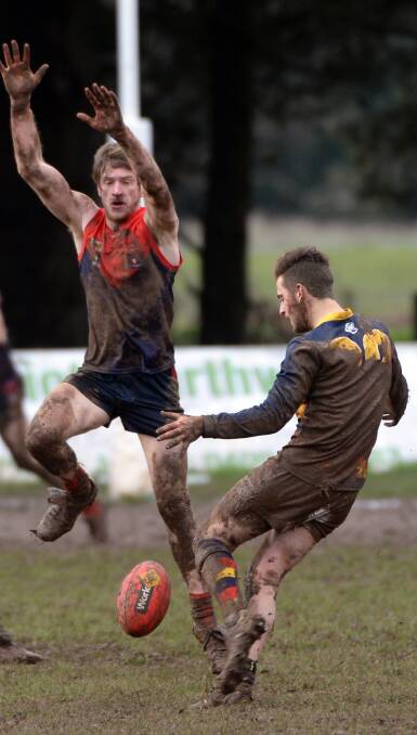 DIRTY WORK: Martin Dufty (Bungaree) and Alex Petrie (Beaufort) during the CHFL match at the weekend. Story page 23. Picture: Kate Healy 