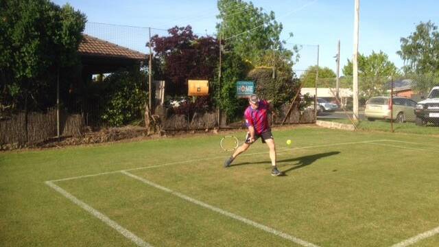 TOP SHOT: Greg Thomas moves in a forehand drive during matches at the Daylesford Lawn Tennis Club at the weekend.