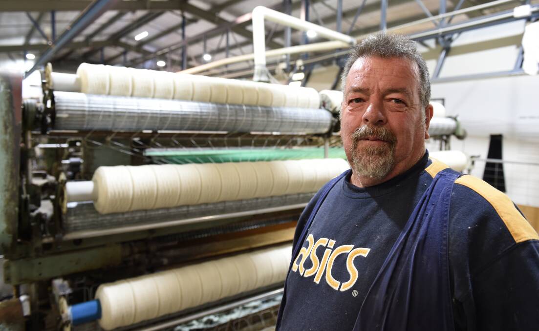 The rouseabout: Robbie Shellew is responsible for the maintenance and operation of the carding and threading machines at the mill. Picture: Lachlan Bence.