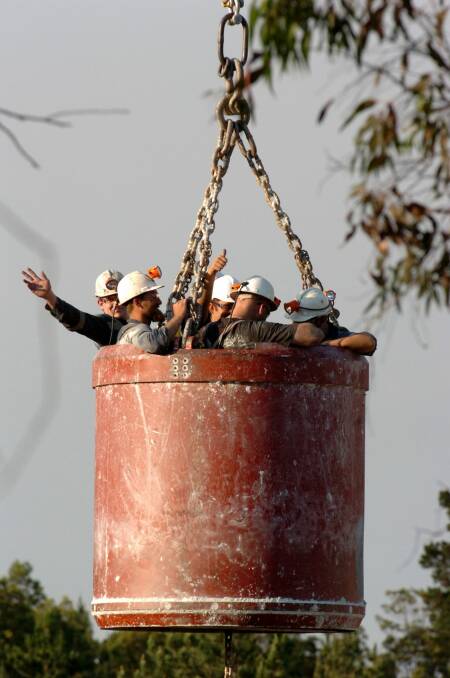 All rescued: miners brought to the surface via a ventilation shaft at the Ballarat Goldmine. Picture: Ian Wilson.