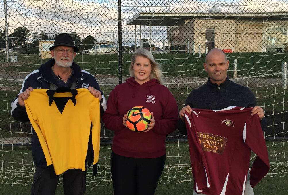 LIGHTS: Creswick Soccer Club stalwart Gerry Flapper, Rebecca Vanderpol and vice-president Jock Charles are looking forward to having the club's lights completed.
