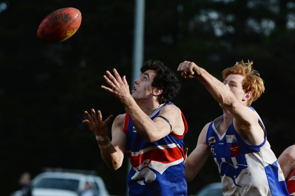 CONTESTED: Daylesford's Seb Walsh looks to take a mark in front of Waubra opponent Dean Robertson on Saturday. Picture: Kate Healy