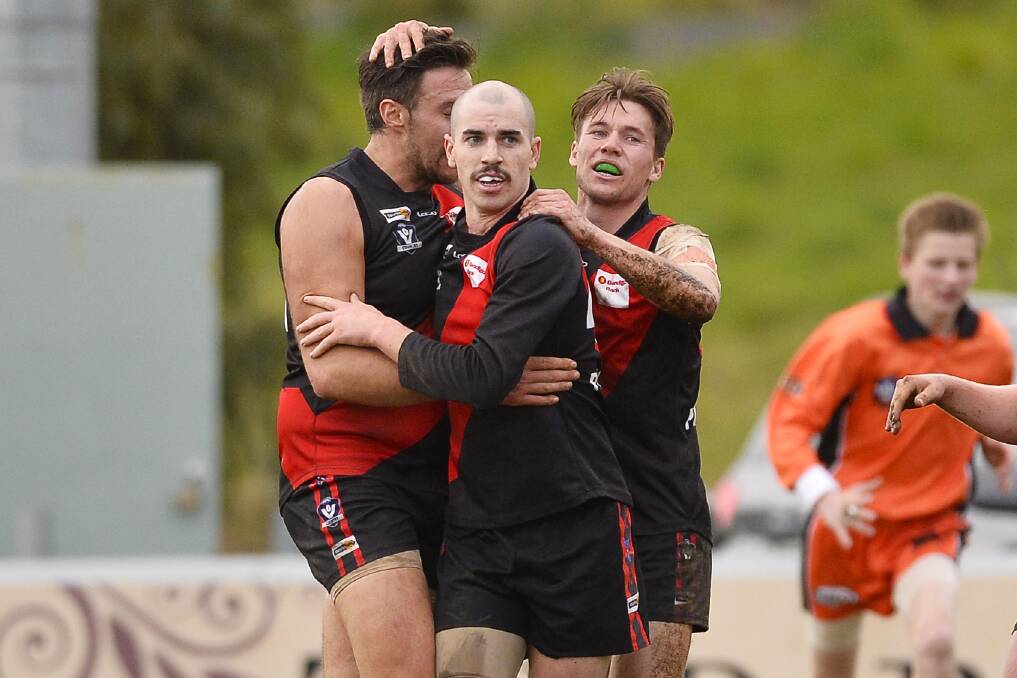 GREAT DAY: Jarrod Rodgers (centre) celebrates a Buninyong goal with Anthony Ebery and Jack Romeril. Picture: Dylan Burns.