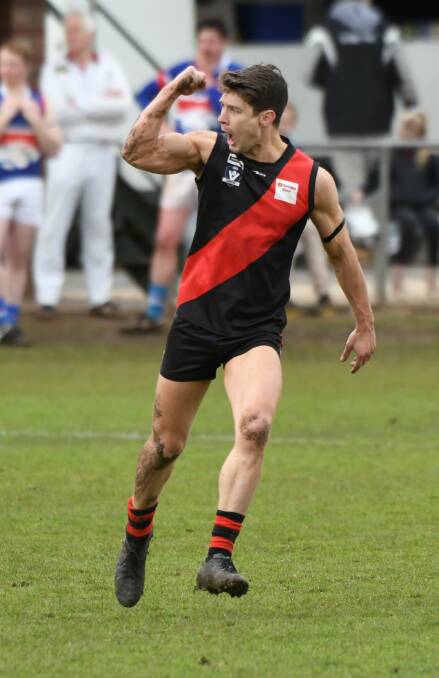 PUMPED: Buninyong's Jake Dunne celebrates a goal during his side's hard-fought victory over Daylesford on Saturday. Pictures: Lachlan Bence.
