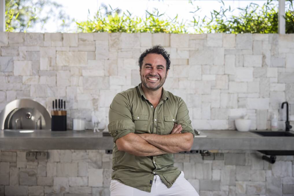 Miguel Maestre in his outdoor kitchen at his Elanora Heights home. Picture: Simon Bennett