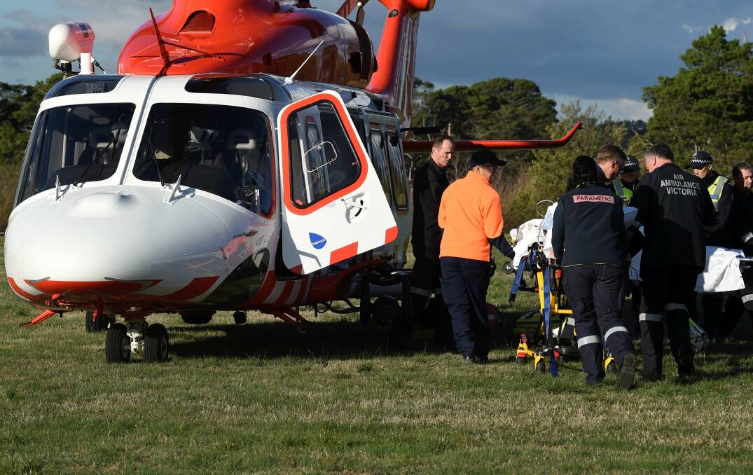 An injured man is airlifted