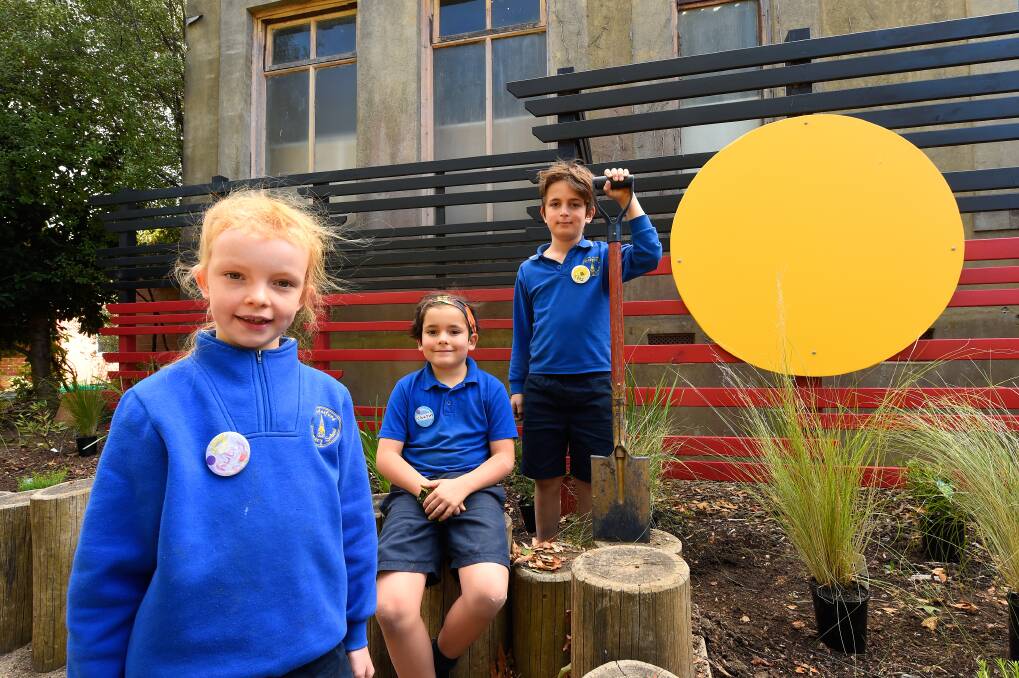 TEAM WORK: Charles Meadows, Ruby Lohse and Chaz Walsh-Menegazzo helped to plant the garden. Photo: Adam Trafford
