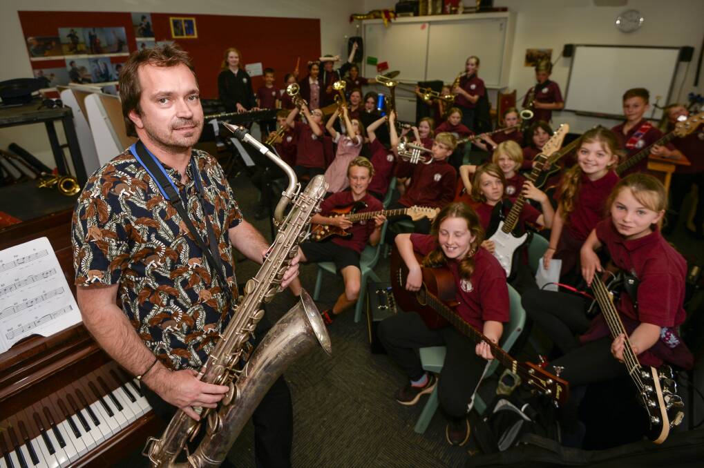 FUN: Trentham and District Primary School's band during rehearsal with their teacher Andrew Zollia. Photo: Dylan Burns