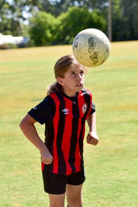 TALENT: Eve Righetti kicked a goal for Daylesford and Hepburn United Soccer Club at the weekend. Photo: Brendan McCarthy