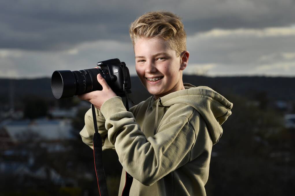 EYE FOR PHOTOGRAPHY: Lochie Johns is a 13-year-old up and coming photographer. Photo: Dylan Burns