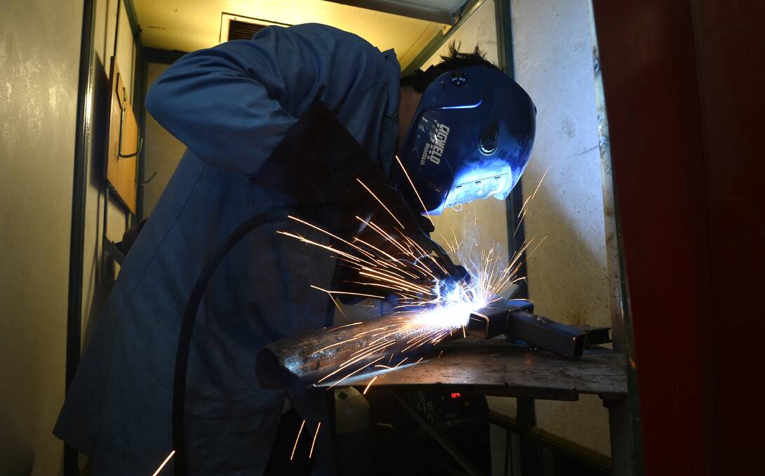 SPARKS FLY: Daylesford Secondary College's year 12 pupil, Tyler Bolton, enjoys learning hands-on skills, like welding, while completing high school. Photo: Dylan Burns