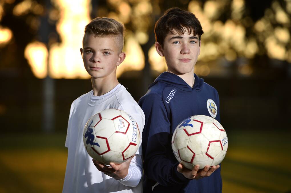 THE WORLD GAME: Daylesford's Eero Partonen, 13, and Luka Straka, 12, have been playing with Ballarat City Juniors for a season. Photo: Dylan Burns