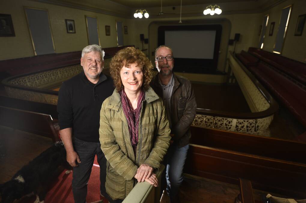 HISTORICAL SETTING: Daylesford Cinema's committee member David Grigg, president Gina Lyons and Marc Dankers. Photo: Dylan Burns