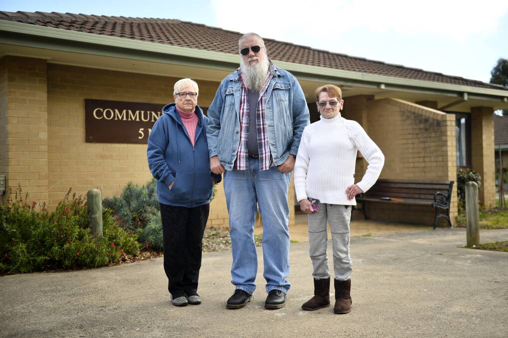 UNHAPPY: Residents living in the Creswick units, Maureen Coppick, Andrew Aiden and Doreen Paulke say the complex is in dire need of proper maintenance. Photo: Dylan Burns