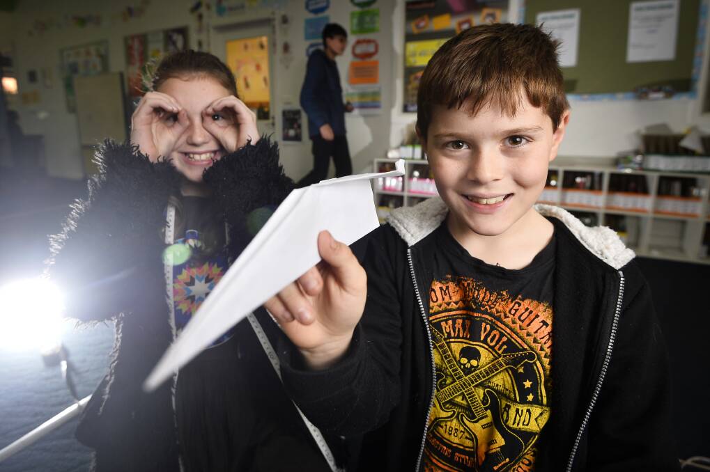 TAKE OFF: Creswick Primary School's pupils, Harrison, 9, and Crystal, 11, enjoy the science and maths challenges. Photo: Dylan Burns