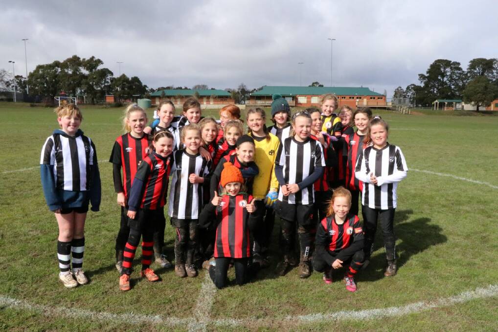 GIRL POWER: Daylesford and Hepburn United Soccer Club's under 11 miniroos girls showed great sportswomanship and just how much they have improved this season during their match against Ballarat North at the weekend. 