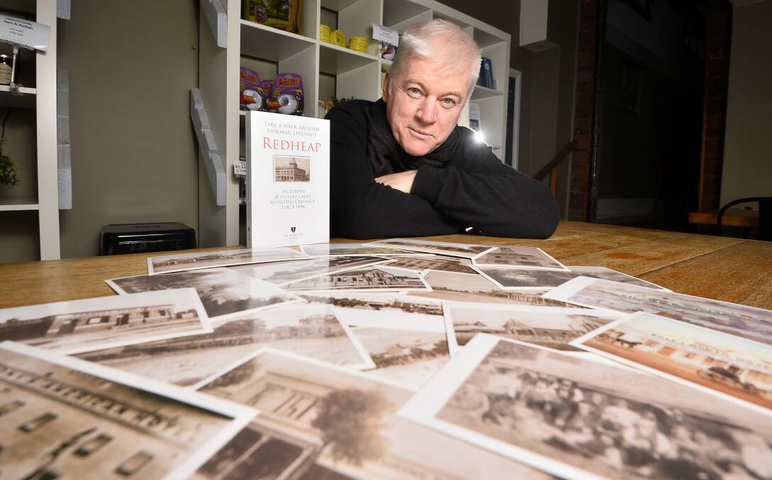 HISTORICAL VIEW: Creswick's Andrew Bell with numerous picture cards included in his guide to Creswick in 1896. The guide includes old photographs of Creswick's fire station, museum, gardens and church. Photo: Dylan Burns