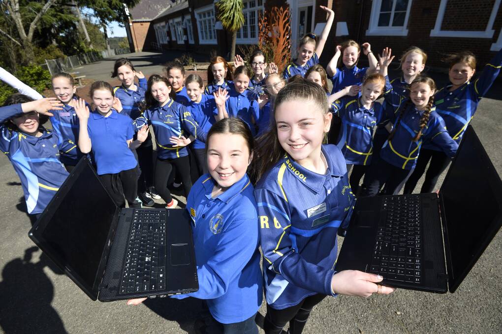 EXCITED: Corinella House Captain Mac Jenkin and School Captain Maddisyn Tsaptsalis with the rest of the Grade 6 girls from Daylesford Primary School. Photo: Dylan Burns