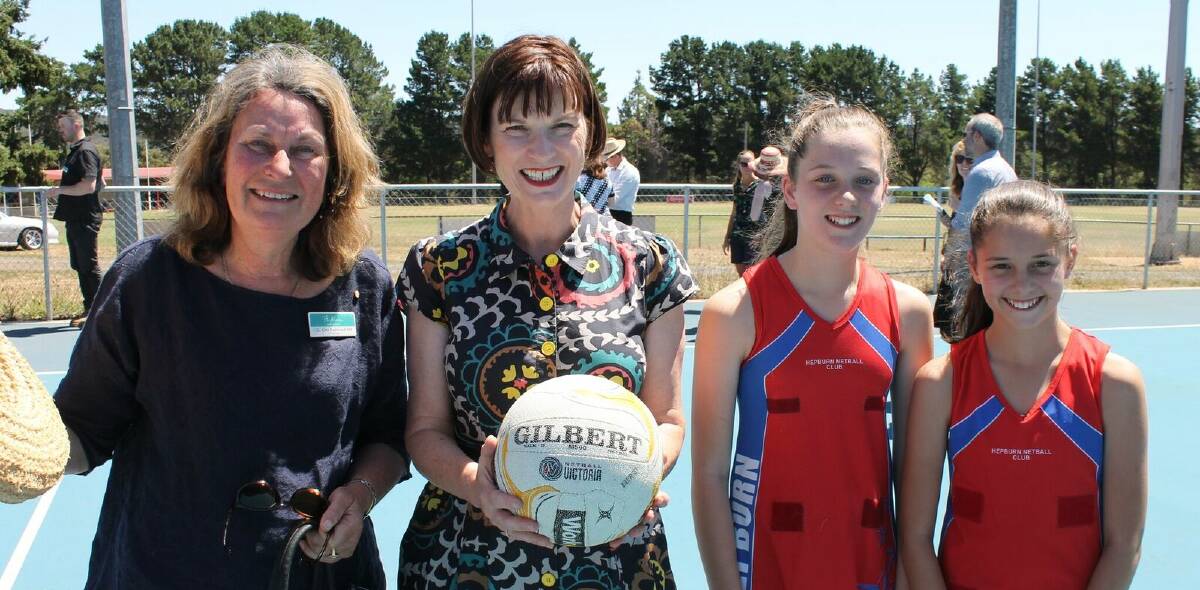 UPGRADE: Cr Kate Redwood, Macedon MP Mary-Anne Thomas and two young netballers at their home ground at Hepburn Recreation Reserve.