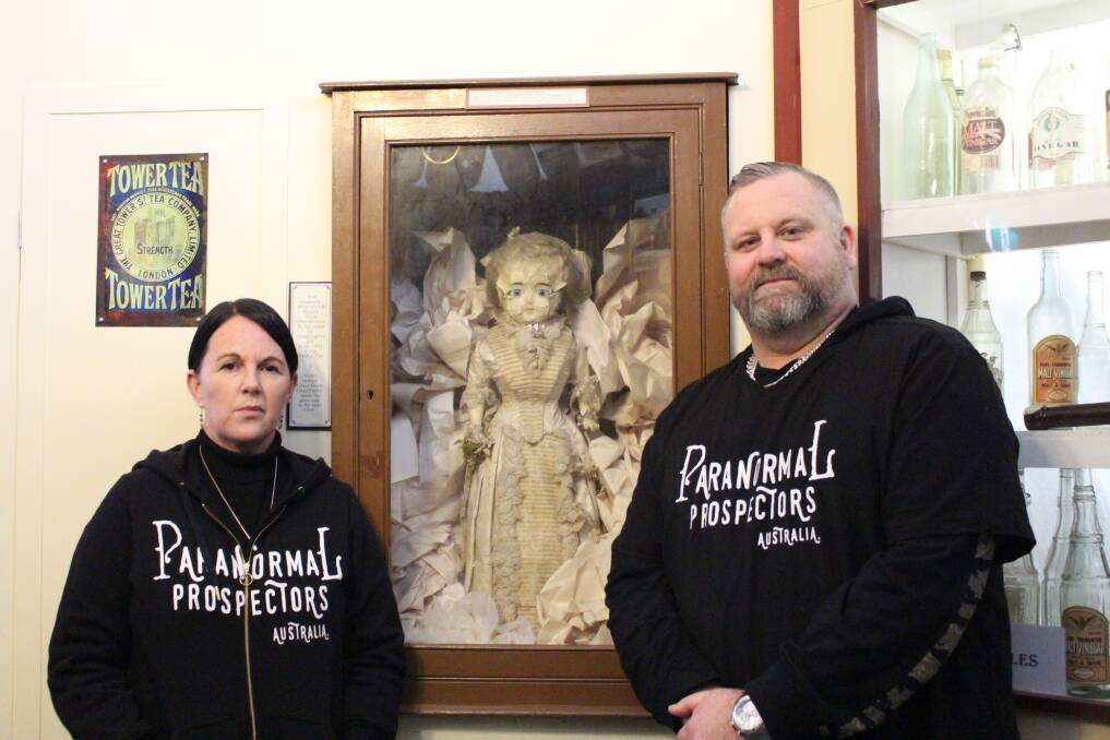 Paranormal Prospectors Bel and Adam with a historic doll in Clunes. Photo: Leslie Scott