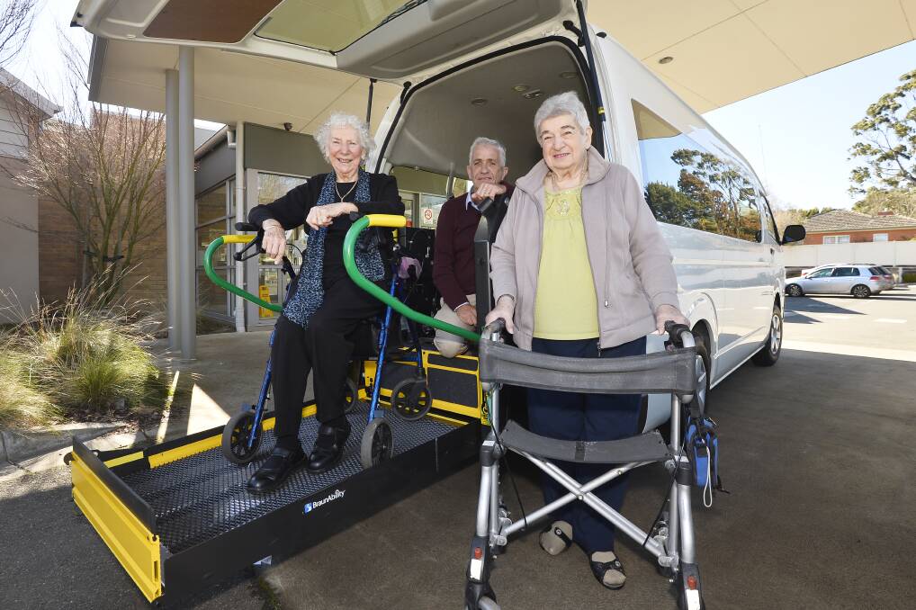 NEW WHEELS: Trentham Aged Care resident Jean Mayne, Director of Nursing Paul Hilder and resident Irene Curran with the residents' new bus. Photo: Dylan Burns 