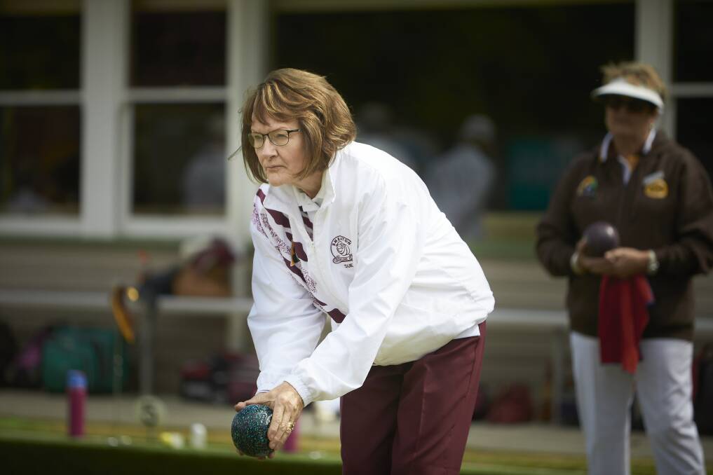 BOWL: Smeaton Bowls Club's Sue Lafranchi has her eye on a win during the midweek pennant game. Photo: Luka Kauzlaric 