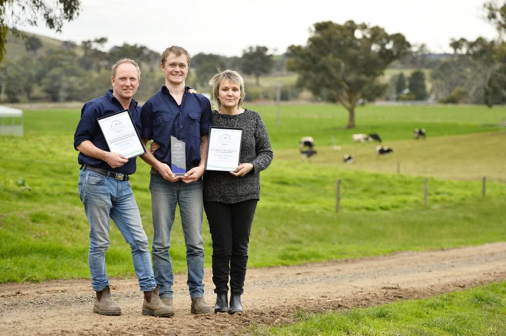 REWARD FOR EFFORT: Robert, Nick and Belinda Morrison at their sixth generation dairy farm in Yandoit, for which they recently won an award for Natural Resources and Sustainability Management. Photo: Dylan Burns