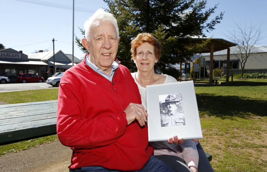 FAMILY HISTORY: Gary Rush, with a photo of his great uncle, Michael Rush, and his wife, Frances. Photo: Dylan Burns