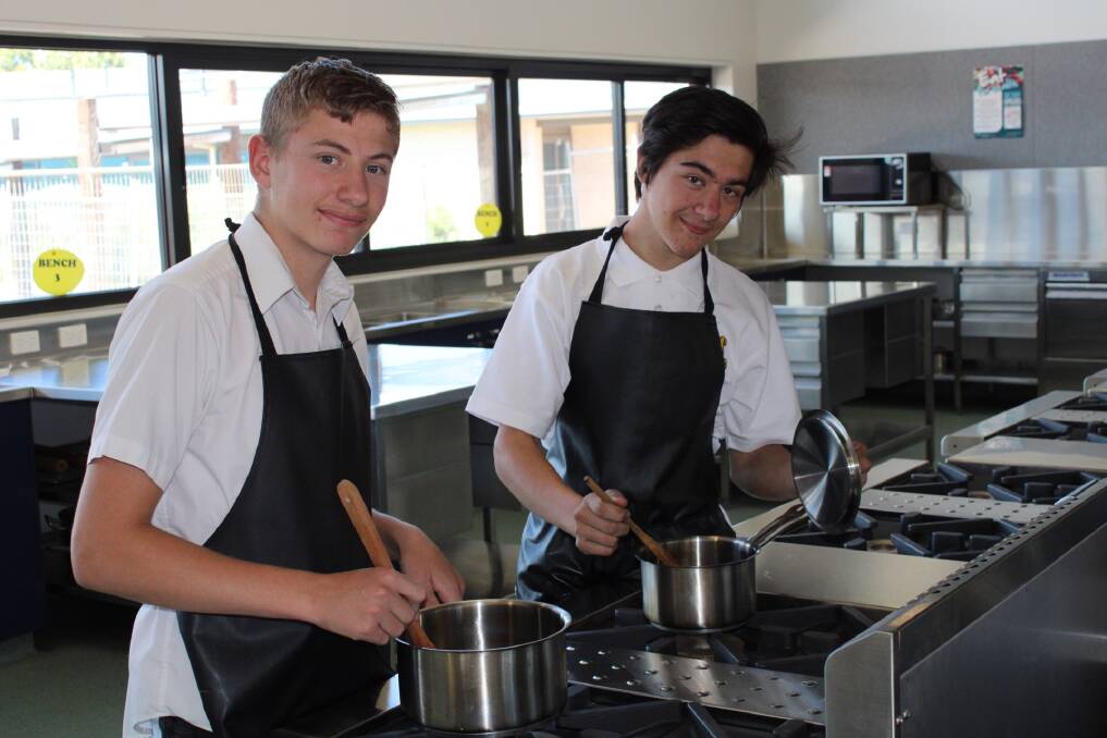 QUALIFIED: Year 11 students Adam Cassar and Josh Barry say the program has benefited them enormously and helped them to get their first jobs. Photo: Hayley Elg