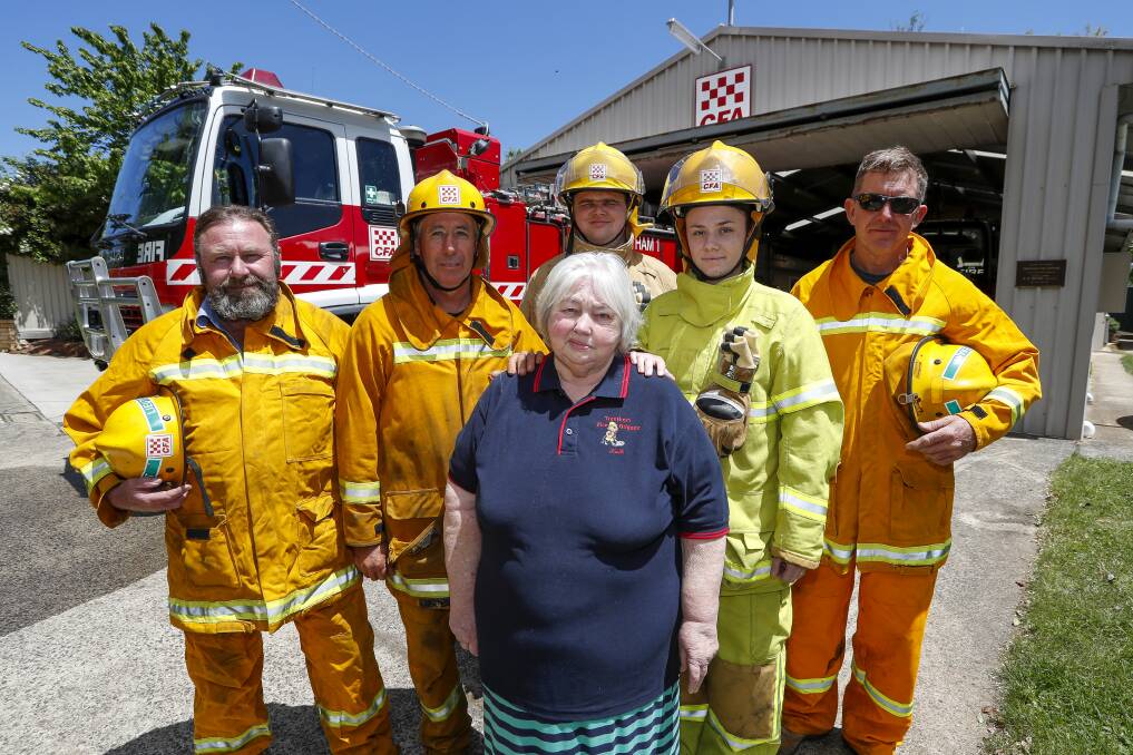 FIREFIGHTERS: Trentham CFA's Paul Healy, David Wheeldon, Kathleen Brown, Ethan Brown, Louise Evans and Pat Sutton. Photo: Dylan Burns