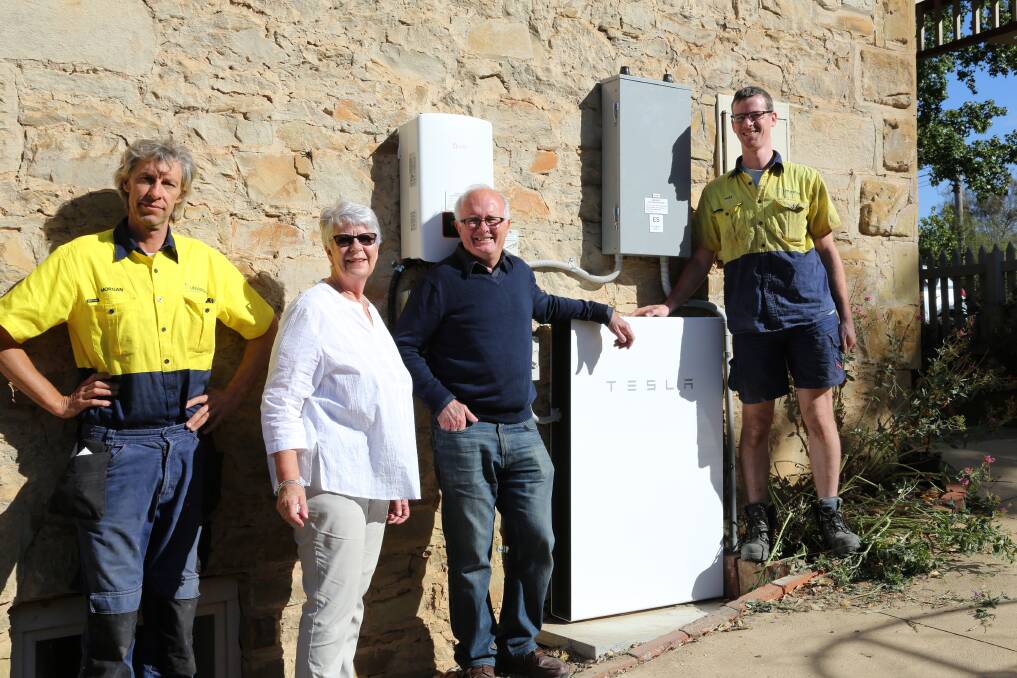 SOLAR: Morgan Kurrajong, Owner of CEC Accredited Solar Installer Universal
Power and Light, Bev and John Tozer with their new Tesla Powerwall 2 home
battery and Alex Orr, also of Universal Power and Light.