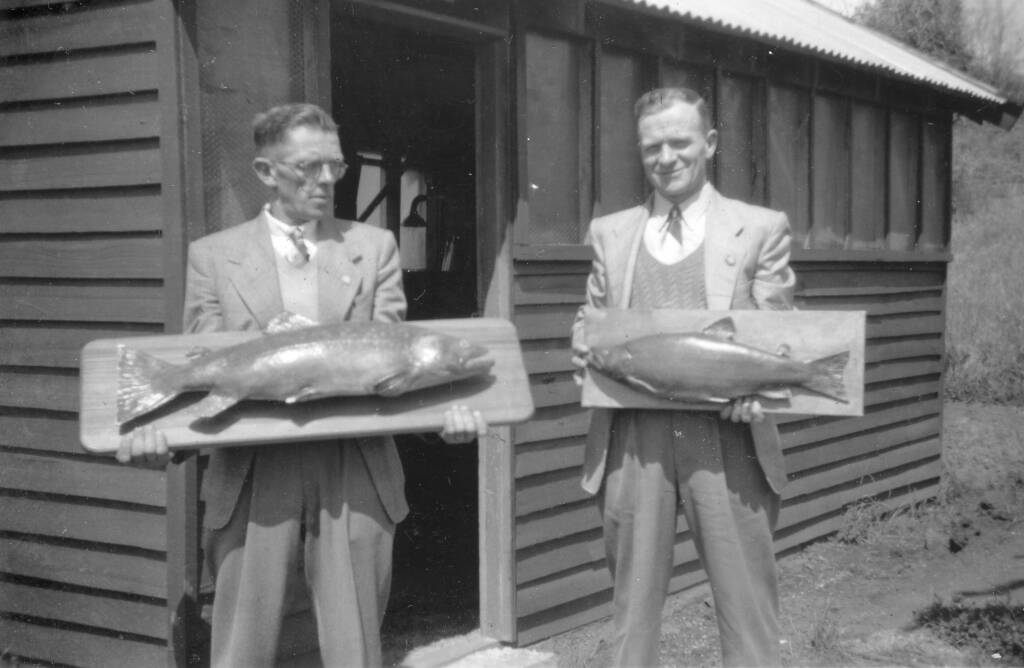 BIG FISH: George May and Jack Elderfield at the hatchery. Photo: Janet McDonald/ Daylesford and District Historical Society