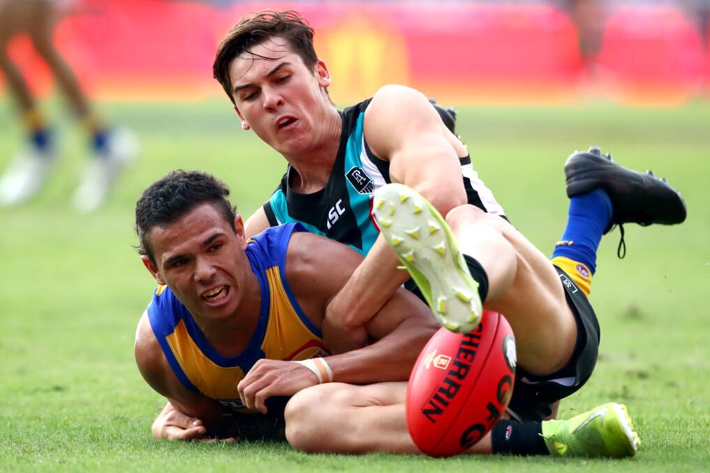 SECOND CHANCE: Jamaine Jones, pictured opposed to Port Adelaide's Connor Rozee, is now a West Coast Eagle. Picture: Getty Images 