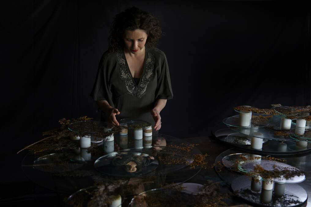 ALCHEMIST: Local artist Louiseann King at work in her studio. Picture: Danny Wootton


