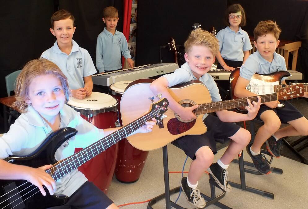 PINT-SIZED PERFORMERS: Darcy, Archer, Jude, Daniel, Indianna and Mason have been mastering new instruments and fine-tuning their songs for the St James' Arts Festival.