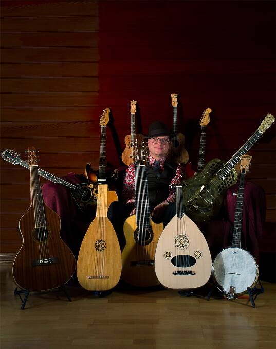 STRINGS: Matthew Fagan with his collection of guitars and other stringed instruments, many of which he will play when he performs in Daylesford on November 11. 
