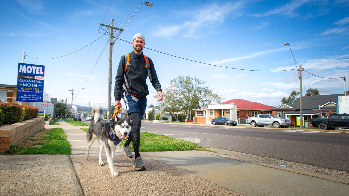 Jordan Taylor and his husky Craig walked from Sydney to Canberra for charity. Picture: Elesa Kurtz