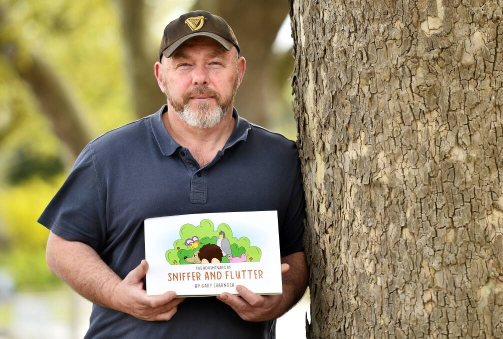 VETERAN SUPPORT: Creswick veteran Gary Charnock says more support is needed for returning soldiers. His new children's book "The Adventures of Sniffer and Flutter" raises funds for the cause. Picture: Dylan Burns. 